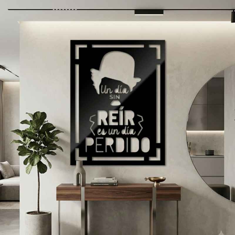 cuadro recortado en metal de charlie chaplin.